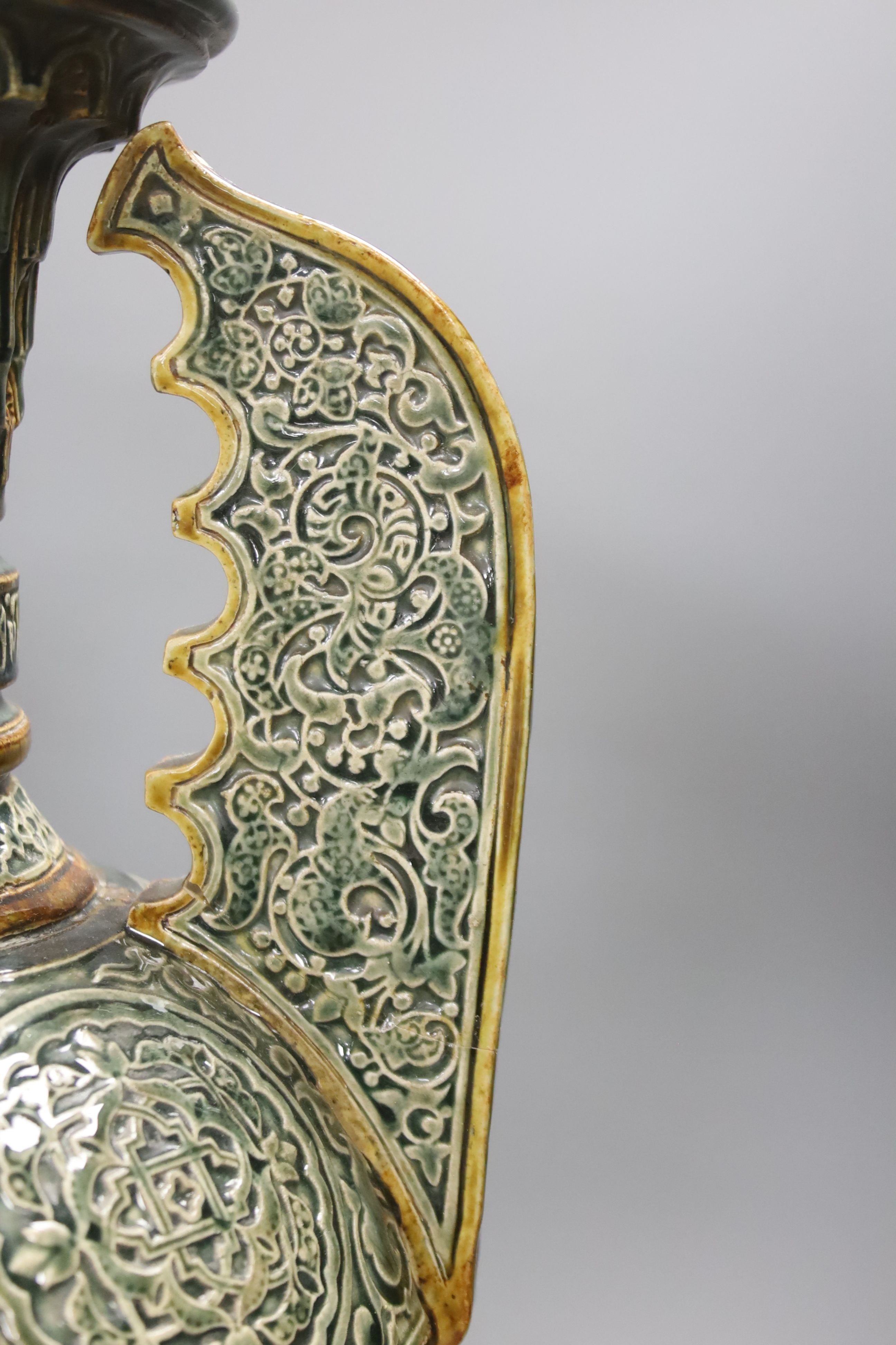 A large Doulton Lambeth Islamic inspired two handled glazed stoneware vase, dated 1880, 47cm, repairs